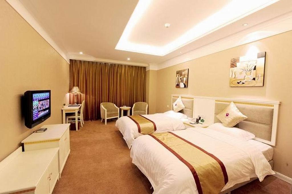 Dragon Hotel Tsjoengking Kamer foto